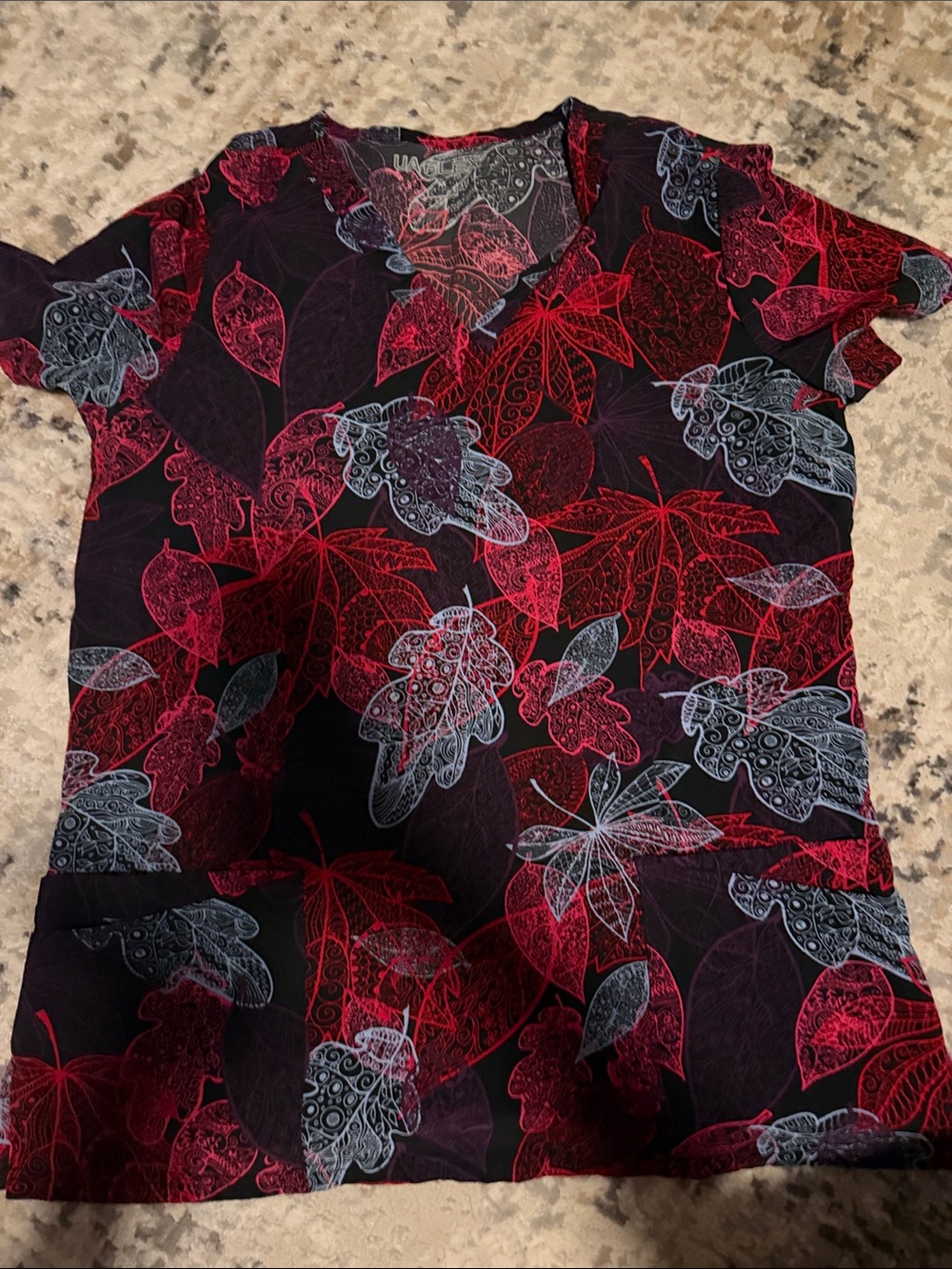 Women's Short Sleeve V-Neck scrub top in Red & Black Leaf Print